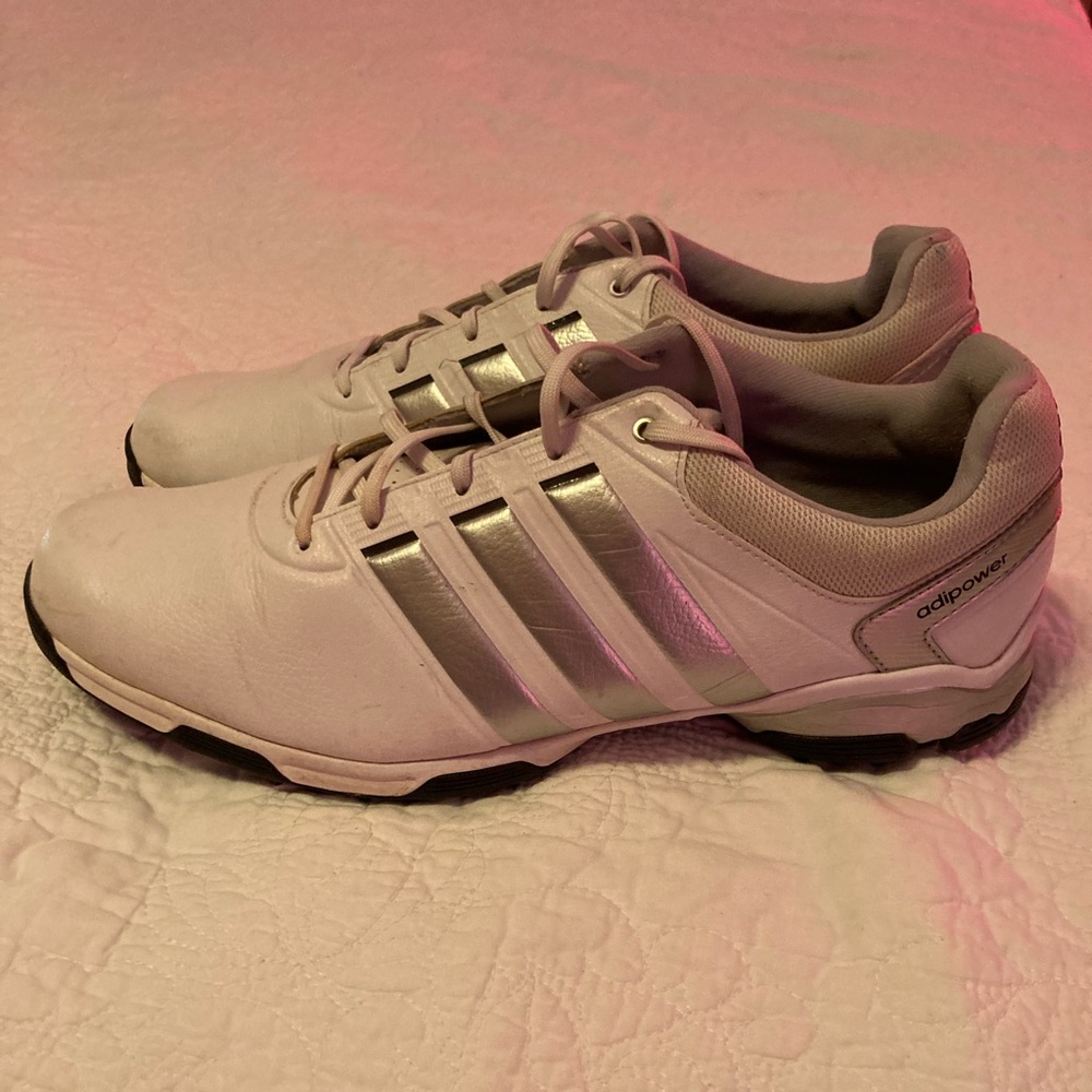 Men’s Adidas golf shoe. Size 11 1/2. White with silver stripes. Good condition.